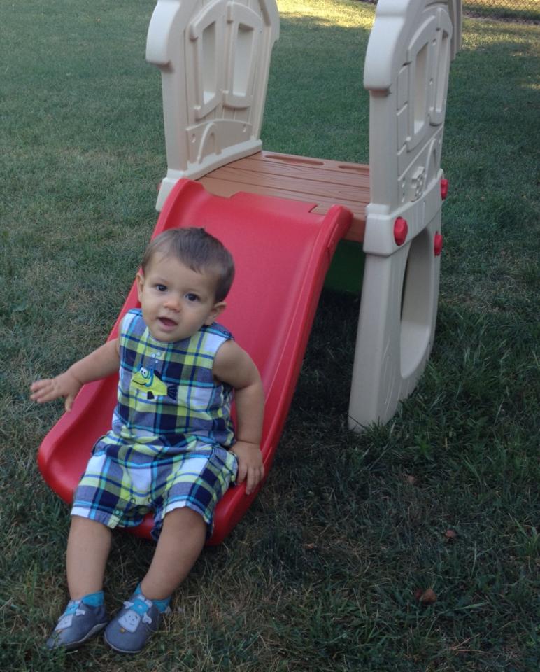 Kirby loves his new slide he got for his birthday.  